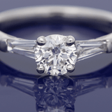 Platinum 0.71ct G SI2 Certificated Diamond Ring with Tapered Baguette Shoulders