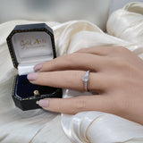 Platinum 0.71ct G SI2 Certificated Diamond Ring with Tapered Baguette Shoulders