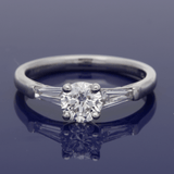 Platinum 0.71ct G SI2 Certificated Diamond Ring with Tapered Baguette Shoulders