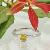 Platinum 0.54ct Natural Yellow Diamond Solitaire Ring with Tapered Baguette Shoulders