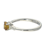 Platinum 0.54ct Natural Yellow Diamond Solitaire Ring with Tapered Baguette Shoulders