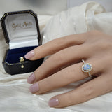 18ct Yellow Gold 0.50ct Oval Opal and Diamond Halo Shoulders Ring