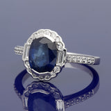 18ct White Gold 2.37ct Oval Sapphire and Diamond Halo Ring