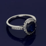 18ct White Gold 2.37ct Oval Sapphire and Diamond Halo Ring
