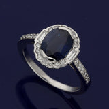 18ct White Gold 2.37ct Oval Sapphire and Diamond Halo Ring