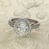 Pre-owned 18ct White Gold Diamond Halo Shoulders Engagement Ring