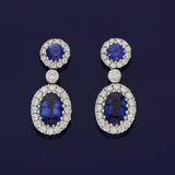 18ct White Gold 1.13ct Sapphire & 0.31ct Diamond Halo Cluster Drop Earrings