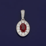 18ct White Gold 0.57ct Ruby & Diamond Oval Halo Pendant