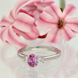 Platinum Oval 0.75ct Pink Sapphire and Diamond Trilogy Ring