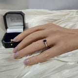 9ct White Gold 0.61ct Oval Sapphire and Diamond 3 Stone Ring