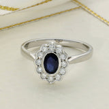 9ct White Gold Oval Sapphire and Diamond Scallop Edge Halo Ring