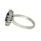 9ct White Gold Oval Tanzanite & 0.92ct Diamond Cluster Halo Ring