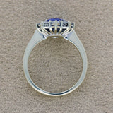 9ct White Gold Oval Tanzanite & 0.92ct Diamond Cluster Halo Ring