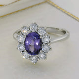 9ct White Gold Oval Tanzanite & 0.92ct Diamond Cluster Halo Ring