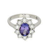 9ct White Gold Oval Tanzanite & 0.92ct Diamond Cluster Halo Ring