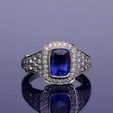 18ct White Gold Cushion Cut Sapphire and Pave Diamond Shoulders Ring