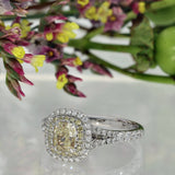 18ct White Gold Natural Yellow Diamond and White Diamond Halo Shoulders Ring