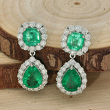18ct White Gold 4.72ct Emerald & 1.88ct Diamond Halo Cluster Drop Earrings