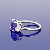 Platinum Trilogy Ring with 3.89ct Tanzanite and Cadillac Diamond Shoulders
