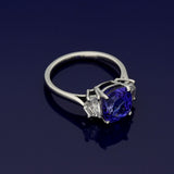 Platinum Trilogy Ring with 3.89ct Tanzanite and Cadillac Diamond Shoulders