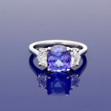 Platinum Trilogy Ring with 3.89ct Tanzanite and Cadillac Diamond Shoulders