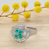 Platinum 0.67ct Emerald and Diamond Ballerina Cluster Cocktail Ring