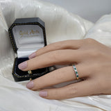 9ct Yellow and White Gold Rub-over Set Emerald and Diamond 7 Stone Ring
