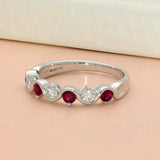 9ct White Gold Ruby and Diamond Half Eternity Wave Ring