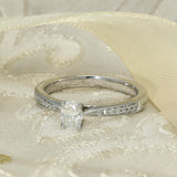 Platinum 0.30ct D VS1 Certificated Oval Cut Diamond Solitaire Ring with Diamond Shoulders