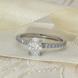 Platinum 0.80ct D VS1 Certificated Oval Cut Diamond Solitaire Ring with Diamond Shoulders