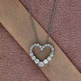18ct White Gold Graduated Diamond Heart Pendant Necklace 16"