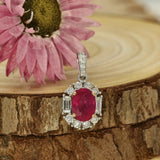 18ct White Gold Oval 0.96ct Ruby & Diamond Halo Pendant