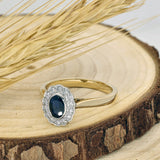18ct Yellow Gold 0.55ct Oval Sapphire & Diamond Halo Ring