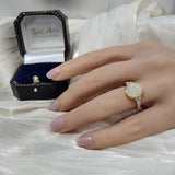18ct Yellow Gold 2.95ct Oval Yellow Opal Ring with Baguette and Round Diamond Set Shoulders