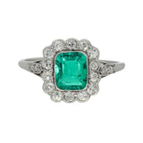 Vintage Platinum Emerald and Old Cut Diamond Halo Ring