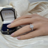 Platinum 0.71ct D SI1 Oval Cut Diamond Halo Ring with Diamond Shoulders