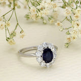 9ct White Gold 1.14ct Oval Sapphire & 0.70ct Diamond Halo Cluster Ring