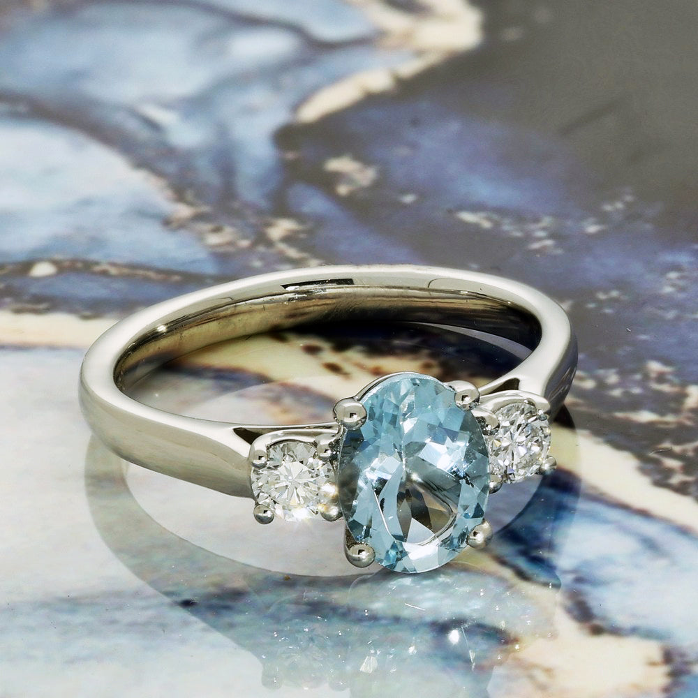 Platinum Oval Cut Aquamarine and Diamond Trilogy Ring