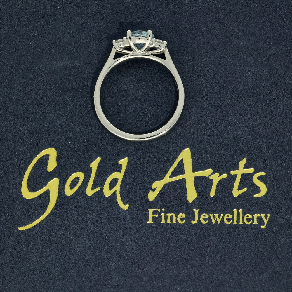 Platinum Oval Cut Aquamarine and Diamond Trilogy Ring