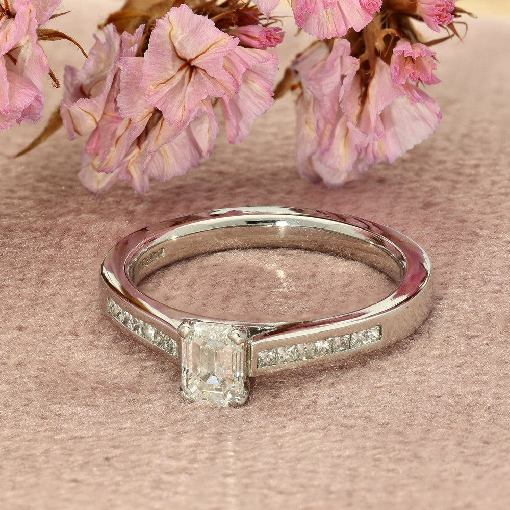 Pre-loved Platinum Certificated 0.51ct Emerald Cut Solitaire Ring with Princess Diamond Shoulders