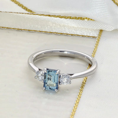 Platinum Emerald Cut Aquamarine and Diamond Trilogy Ring