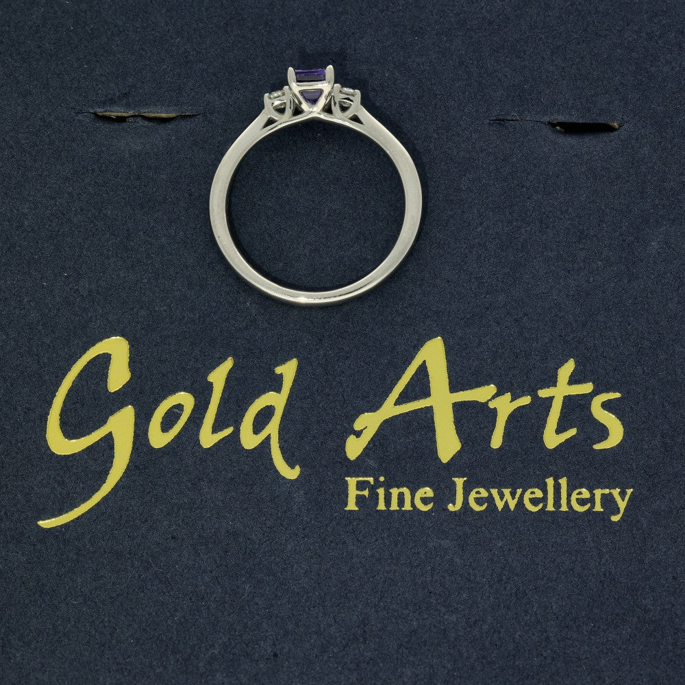 Platinum Emerald Cut Tanzanite and Diamond Trilogy Ring