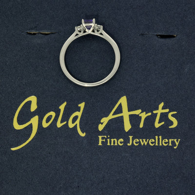 Platinum Emerald Cut Tanzanite and Diamond Trilogy Ring