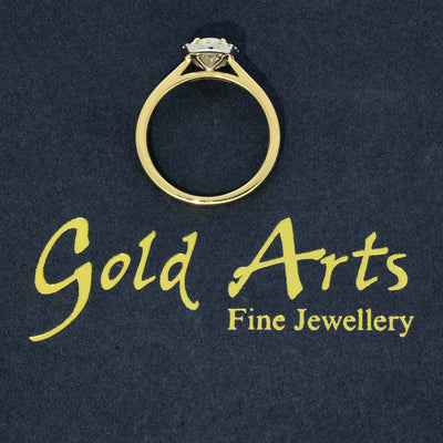 18ct Yellow Gold Opal and Diamond Oval Halo Ring