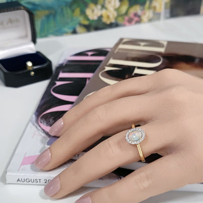18ct Yellow Gold Opal and Diamond Oval Halo Ring