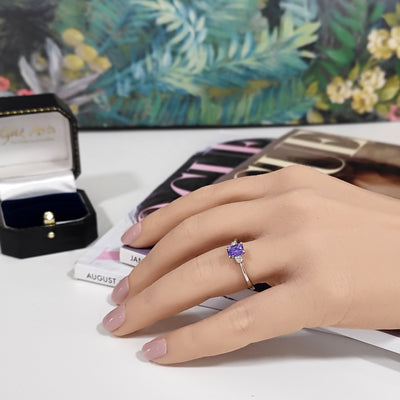 Platinum Emerald Cut Tanzanite and Diamond Trilogy Ring
