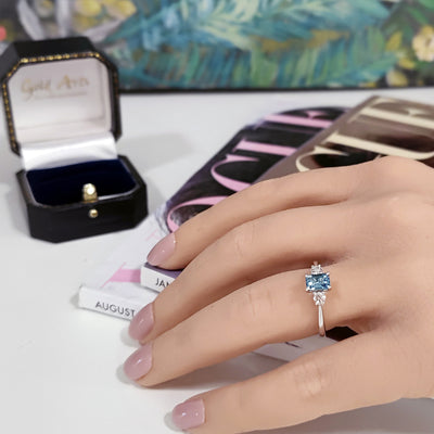 Platinum Emerald Cut Aquamarine and Diamond Trilogy Ring