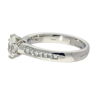 Platinum Certificated 0.70ct Oval Diamond Solitaire Ring with Princess Cut Shoulders