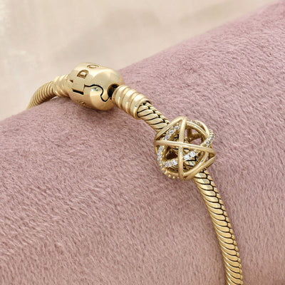 Pre-loved Pandora Retired 14K Gold Galaxy Openwork Charm with Clear Zirconia - 750827CZ