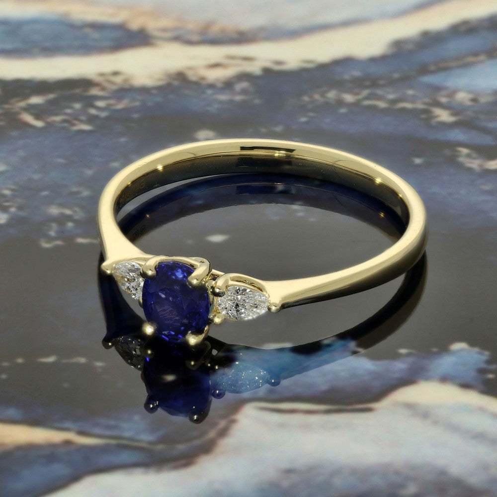 18ct Yellow Gold Sapphire and Pear Diamond Trilogy Ring